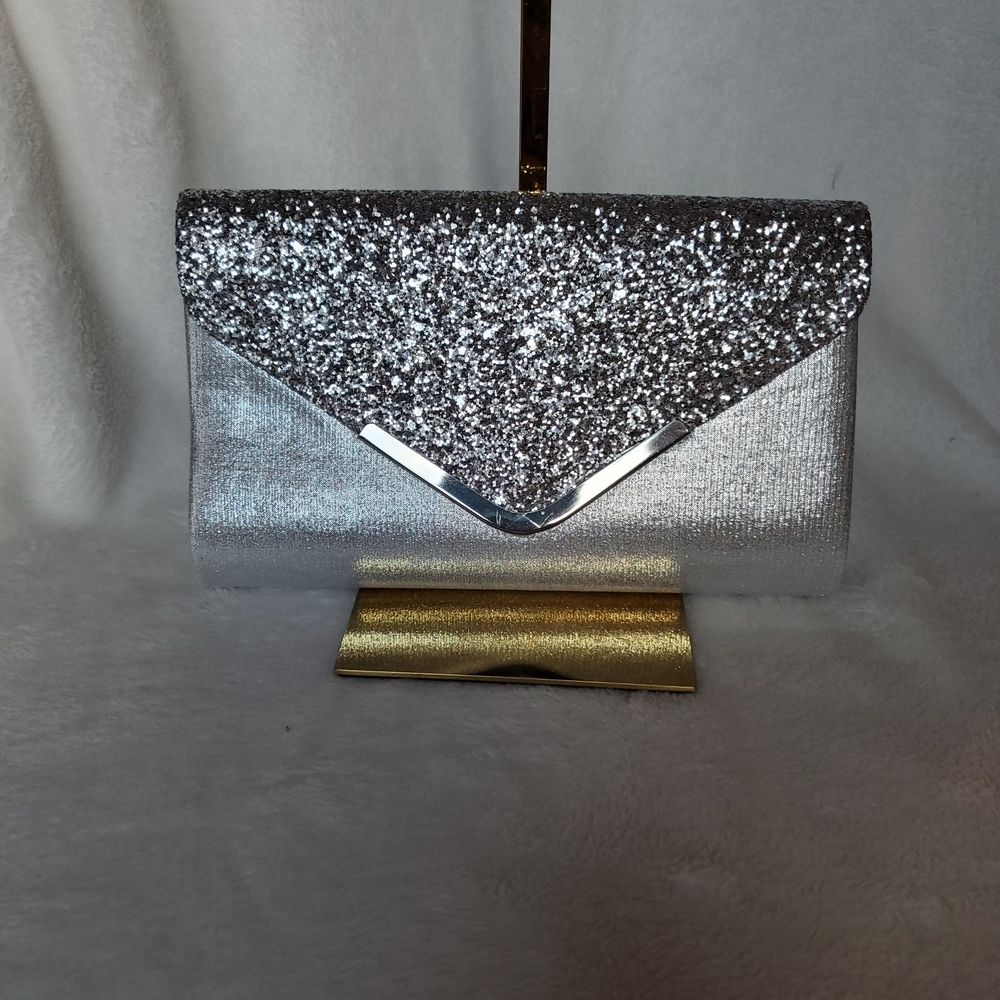 Shine Bright With This Stunning Cute shimmering silver glitter clutch!
